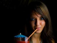 Brittany Drinking in the Tiki Bar : Maya Breeze Inn Placencia : Belize
