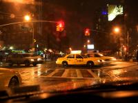 Taxi, Storm, lonely guy and the poster Girl : 14th and 9th Av : NYC