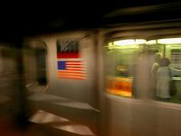 Riders and Flag : Passing Subway Car : C train 23rd St NYC